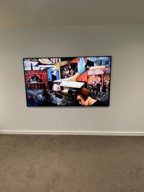 Completed TV installation with hidden cables