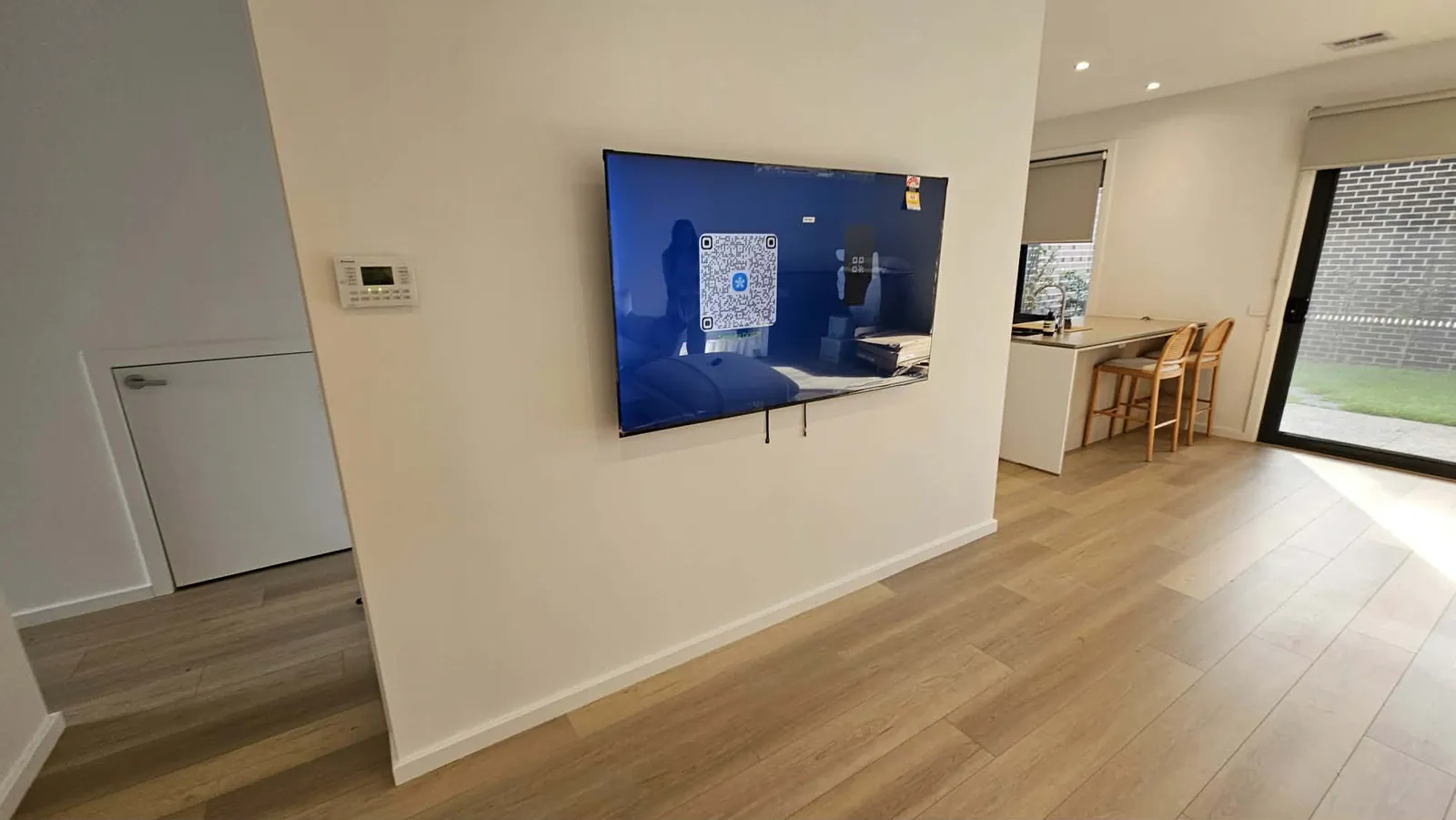 TV mounted in a new build estate home in Tarneit