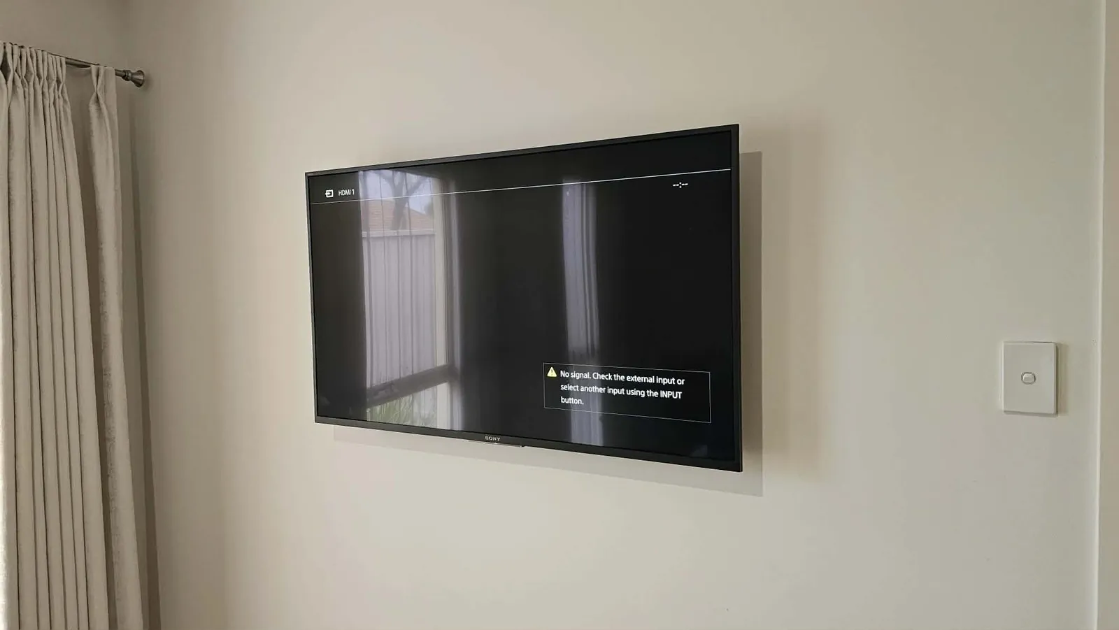 TV wall mounted on plaster in a Hoppers Crossing style home