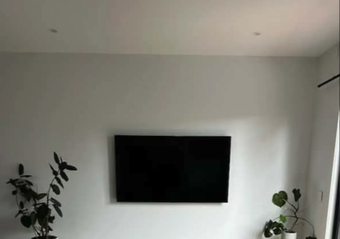 TV mounted in a new build estate home in Manor Lakes
