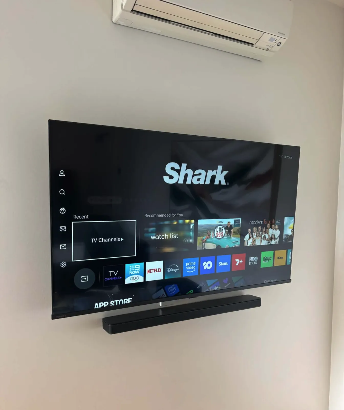 TV and soundbar wall mounted on plaster wall